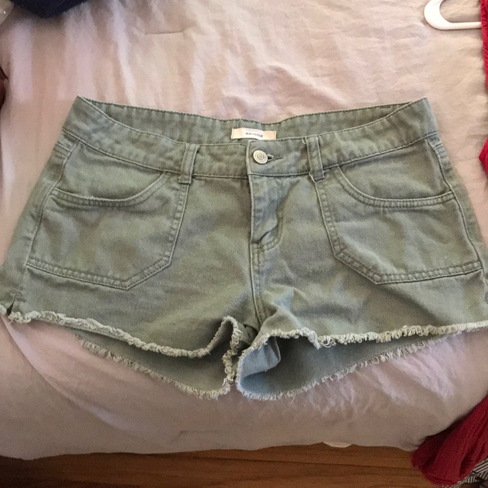 Green cut off shorts